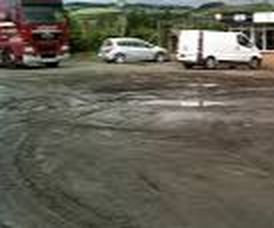 Muddy Parking Lot Discourages Clients  Charlotte NC Paving