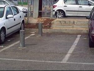 Poles Embedded in Parking Slot- What For?